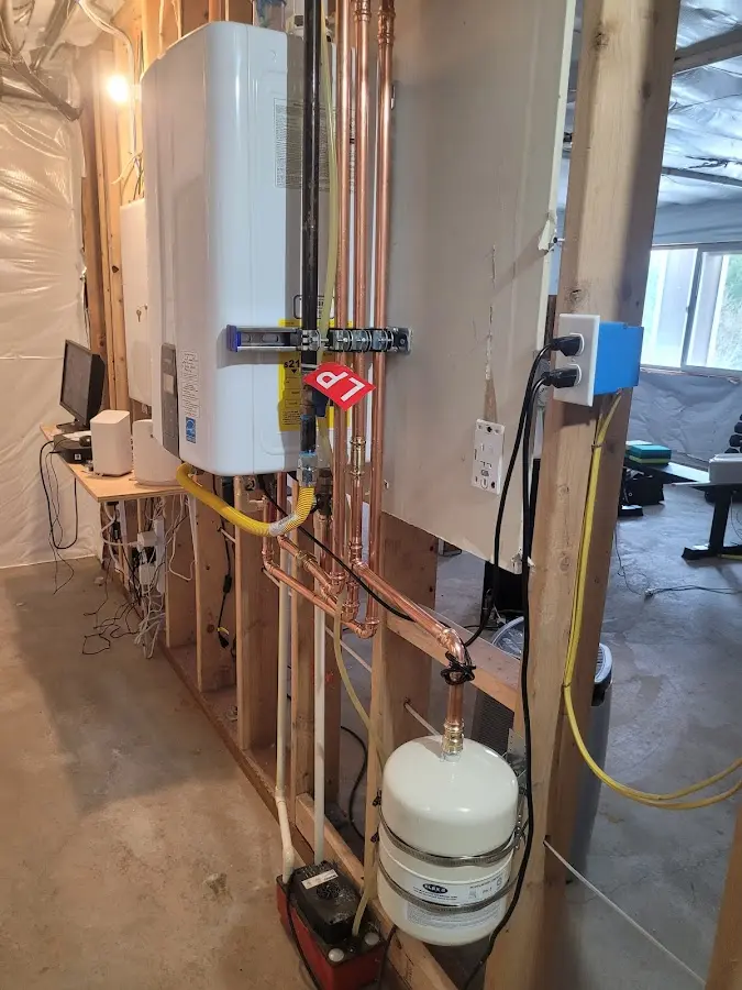 Licensed plumber repairing a kitchen sink in LaGrange